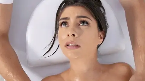 Greased up black-haired is getting her pussy finger-tickled