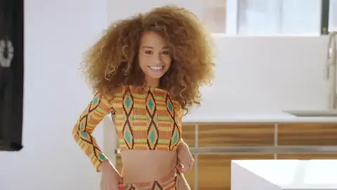 Nubile dark-hued with wavy hair is railing a enormous man-meat on the couch